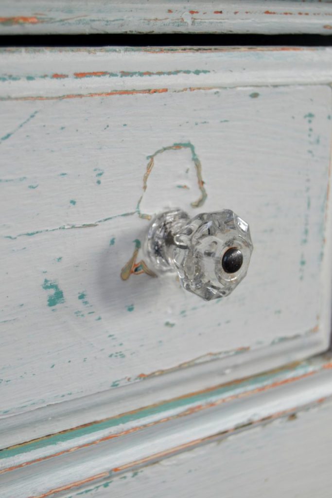 If you have glass hardware on a piece you want to make over, this post will show you the easiest trick for how to remove paint from glass hardware in no time. Click over to get the secret hack!