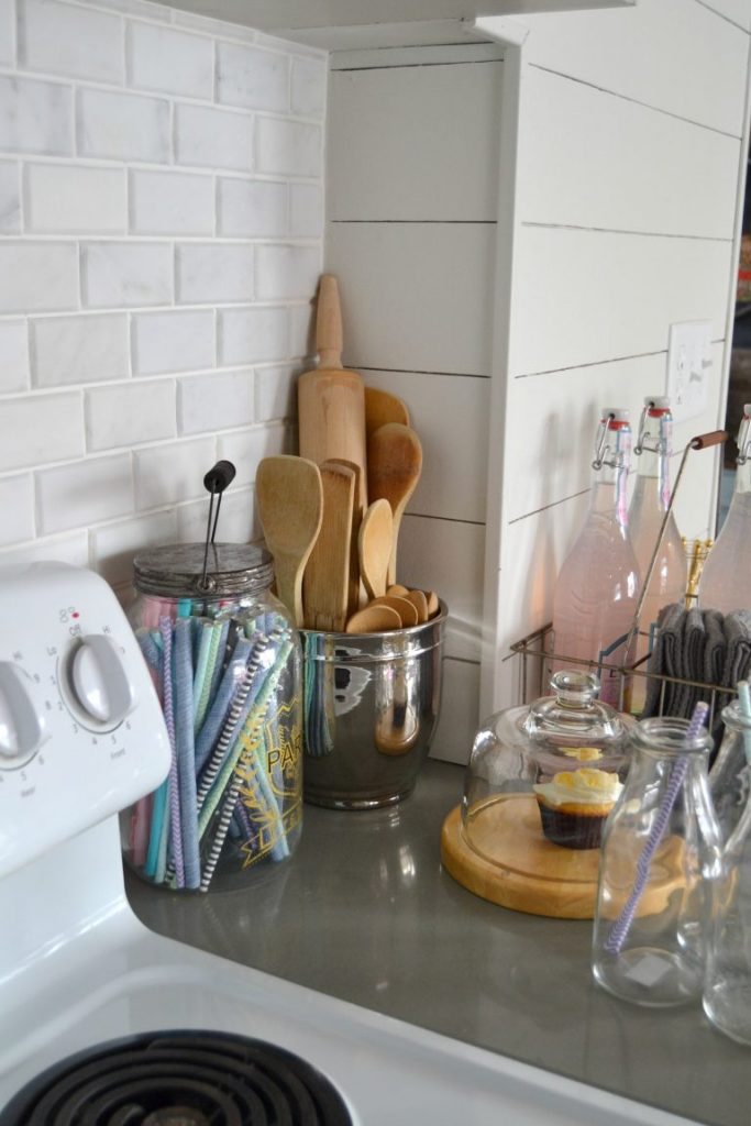 If you would like to change the look of your kitchen, but have a tight budget to work with, click over to see how we saved a lot of money on this DIY Kitchen Makeover!