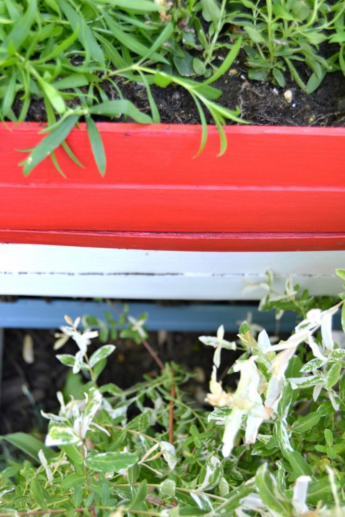 If you are looking for a fun way to add some patriotic flair to your yard this season, click over and see how to DIY this Red, White & Blue Rectangular Planter in no time!