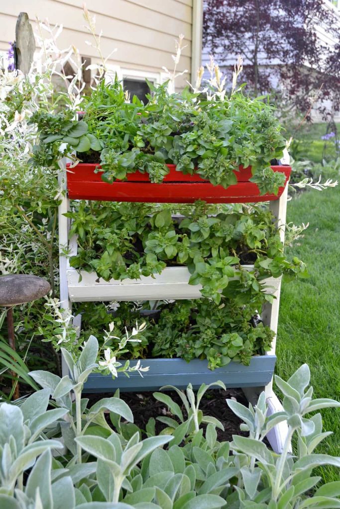 If you are looking for a fun way to add some patriotic flair to your yard this season, click over and see how to DIY this Red, White & Blue Rectangular Planter in no time!