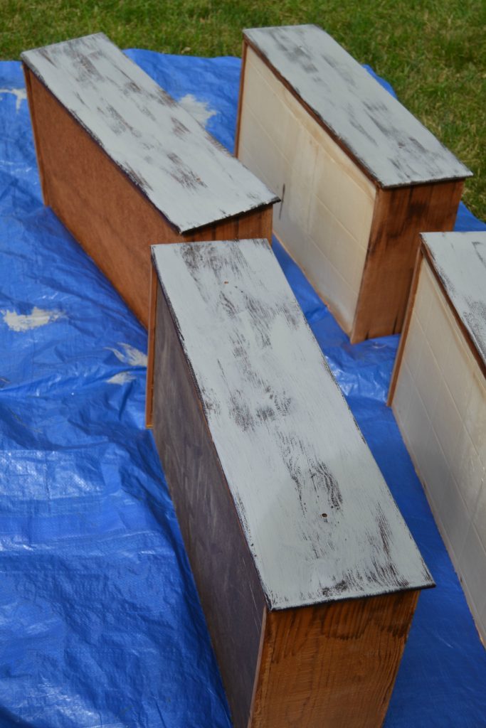 Do you love rustic touches in home decor, but don't want to spend a lot of money to get it? Click over and find this easy rustic dresser makeover that was done with stain and paint. 