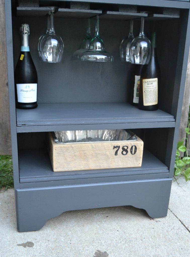 If you are looking for an easy way to have a home bar in your space, click over to see how to build a bar out of an old dresser!
