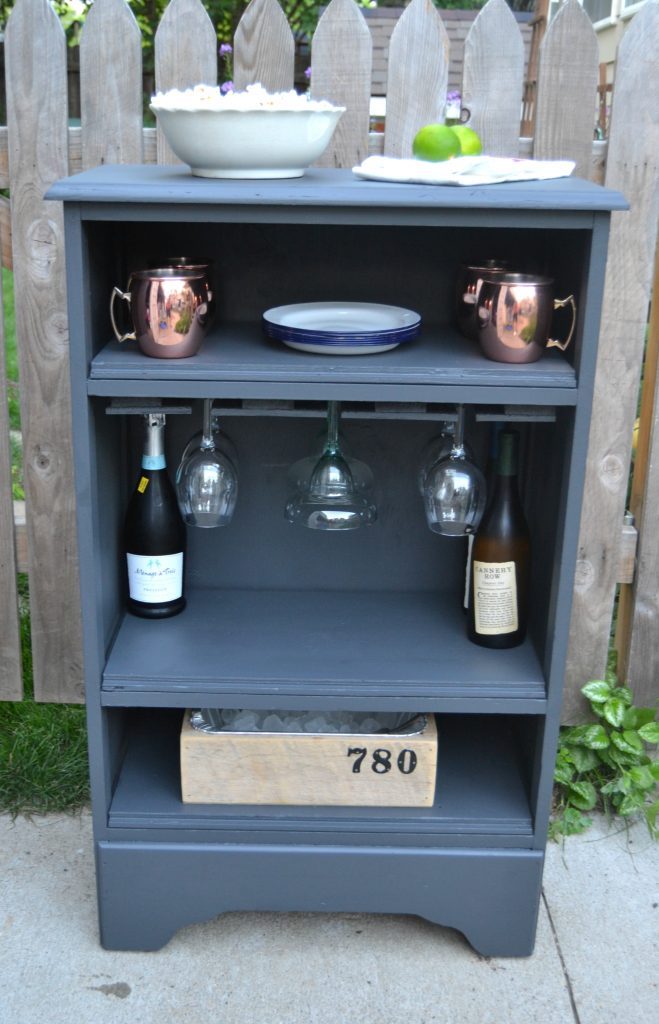 If you are looking for an easy way to have a home bar in your space, click over to see how to build a bar out of an old dresser!