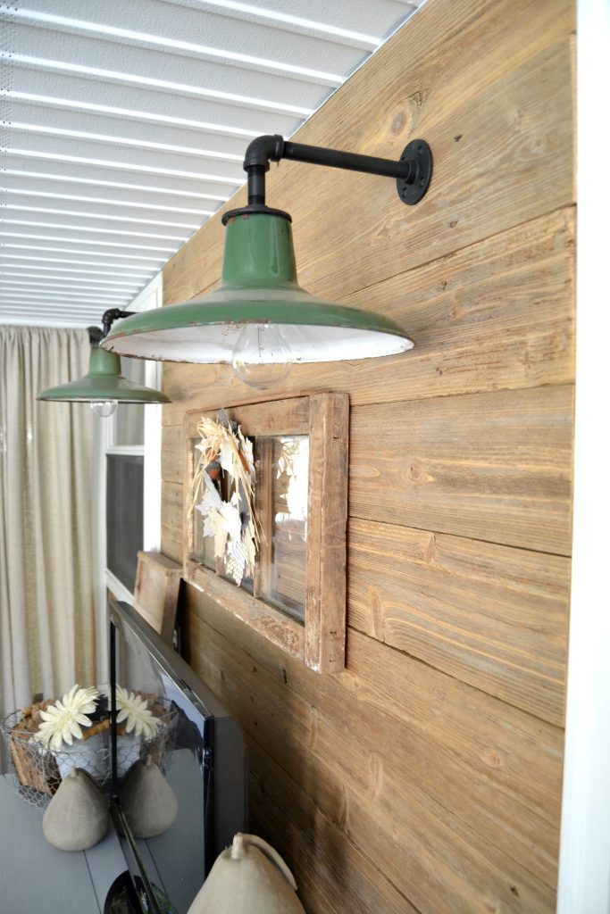 Do you have a back porch that is in need of a makeover? Click over to see how we DIY'd a back porch makeover to keep costs down and still make it a cozy spot for our family.