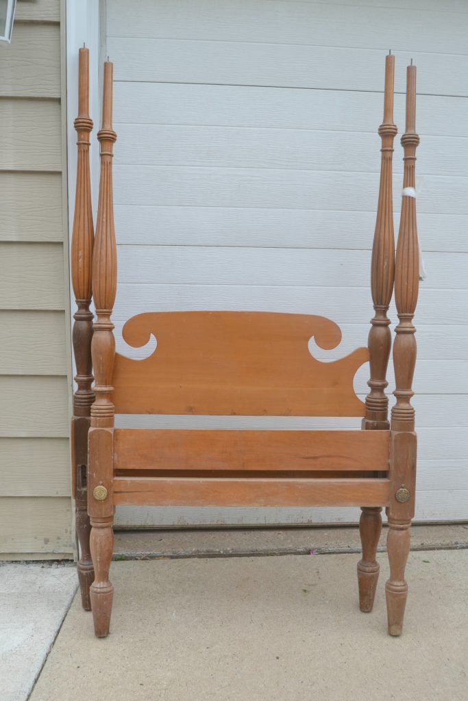 Are you looking for an entryway bench, but don't want to spend a lot of money? Click over to get the tutorial on how to repurpose a bed frame into a custom entryway bench. 