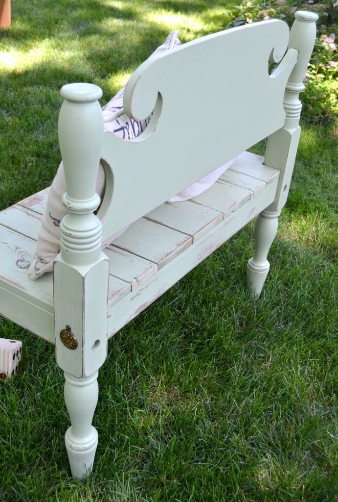 Are you looking for an entryway bench, but don't want to spend a lot of money? Click over to get the tutorial on how to repurpose a bed frame into a custom entryway bench. 