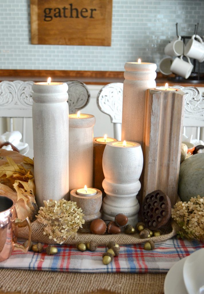 If you love wooden candlesticks, but don't want to pay the high price tag that they have in stores, click over to get the tutorial for these easy DIY Wooden Candle Holders that make a great statement wherever they are.