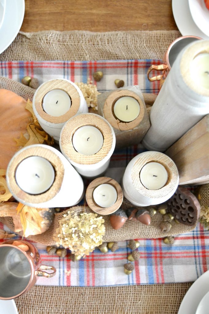 If you love wooden candlesticks, but don't want to pay the high price tag that they have in stores, click over to get the tutorial for these easy DIY Wooden Candle Holders that make a great statement wherever they are.