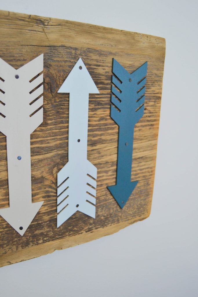 If you like the arrow symbol and want to add more of it to your home, click over to see how easy it is to make DIY arrow art for any space in your home!