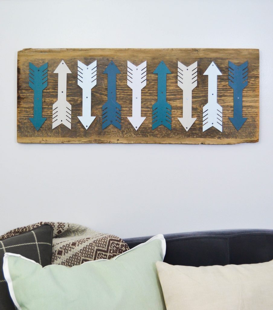 If you like the arrow symbol and want to add more of it to your home, click over to see how easy it is to make DIY arrow art for any space in your home!