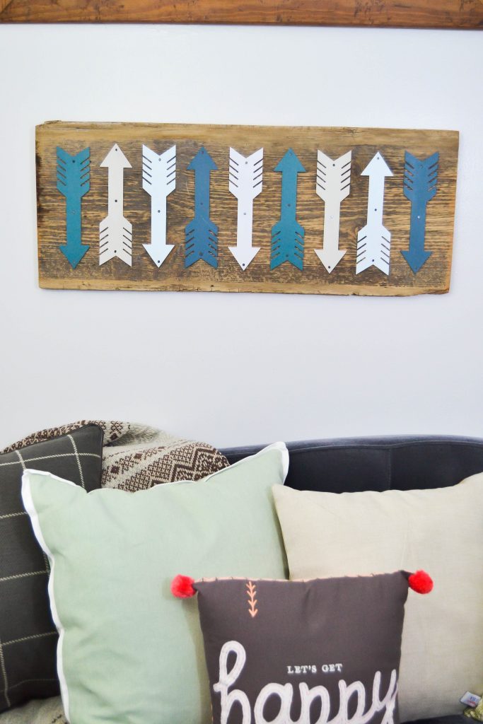 If you like the arrow symbol and want to add more of it to your home, click over to see how easy it is to make DIY arrow art for any space in your home!