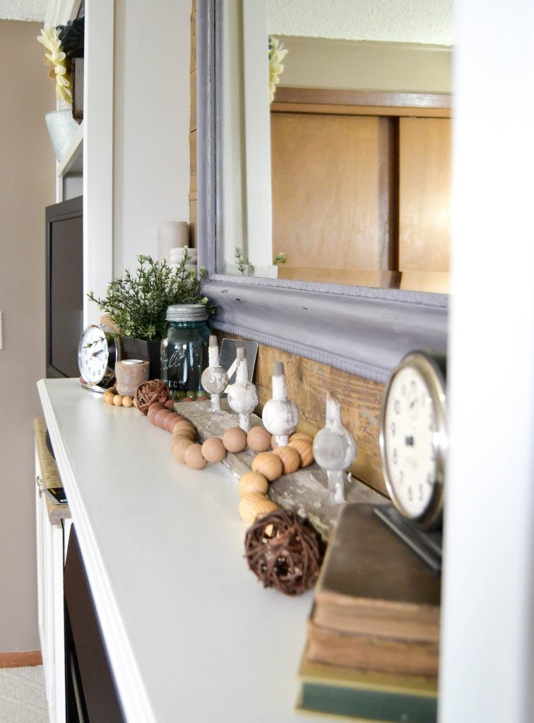 If you like the look of reclaimed barn wood and want to add it to your home, click over and see how we used it to make over our mantel in our family room. 