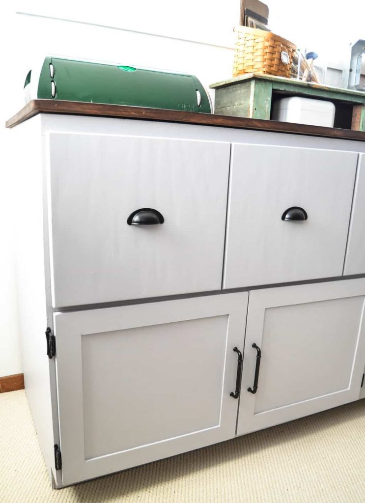 Office Cabinet Makeover - Looking for ways to make over furniture for your home office? This Office Cabinet Makeover takes a run down piece and makes it pretty again and perfect for an office. 