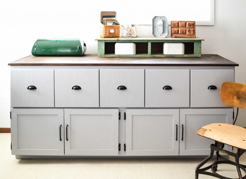 Office Cabinet Makeover - Looking for ways to make over furniture for your home office? This Office Cabinet Makeover takes a run down piece and makes it pretty again and perfect for an office. 