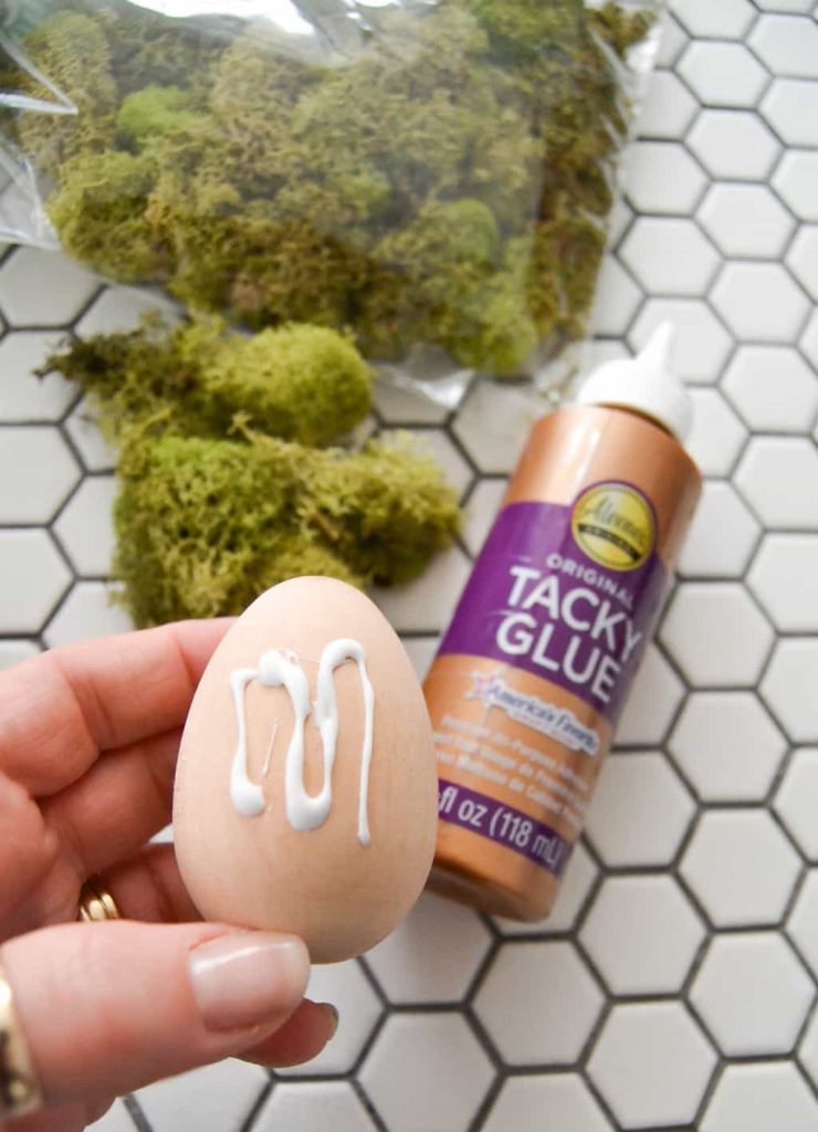 DIY Mossy Spring Easter Egg - Want to make some spring decor that will brighten your decor? Make these DIY Mossy Spring Easter Eggs to add to your mantel, tablescape or side tables. 