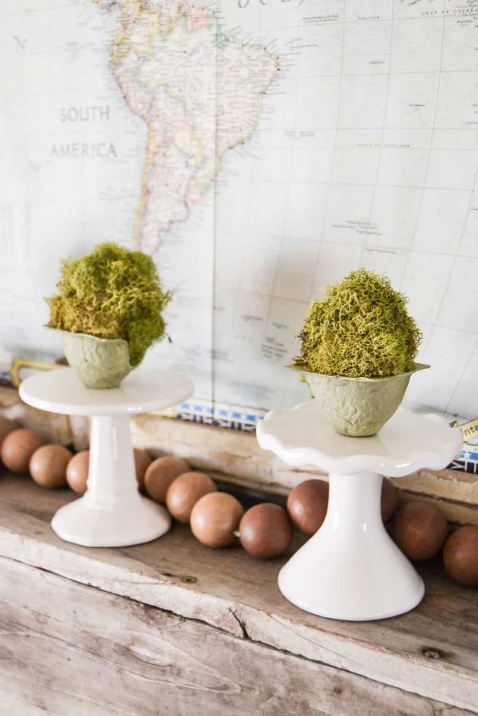 DIY Mossy Spring Easter Egg - Want to make some spring decor that will brighten your decor? Make these DIY Mossy Spring Easter Eggs to add to your mantel, tablescape or side tables. 
