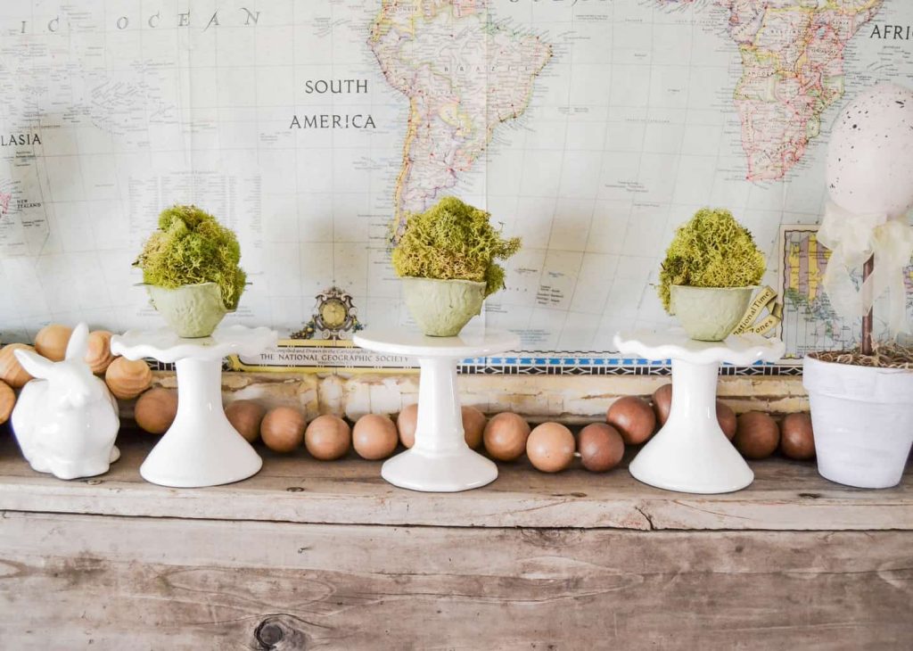 DIY Mossy Spring Easter Egg - Want to make some spring decor that will brighten your decor? Make these DIY Mossy Spring Easter Eggs to add to your mantel, tablescape or side tables. 