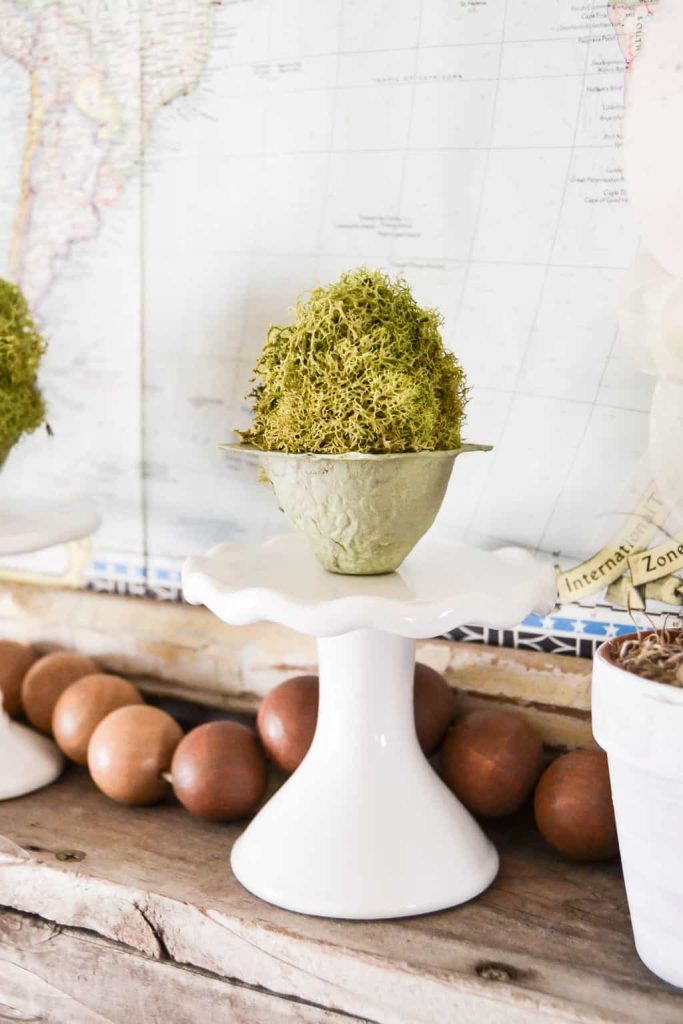 DIY Mossy Spring Easter Egg - Want to make some spring decor that will brighten your decor? Make these DIY Mossy Spring Easter Eggs to add to your mantel, tablescape or side tables. 
