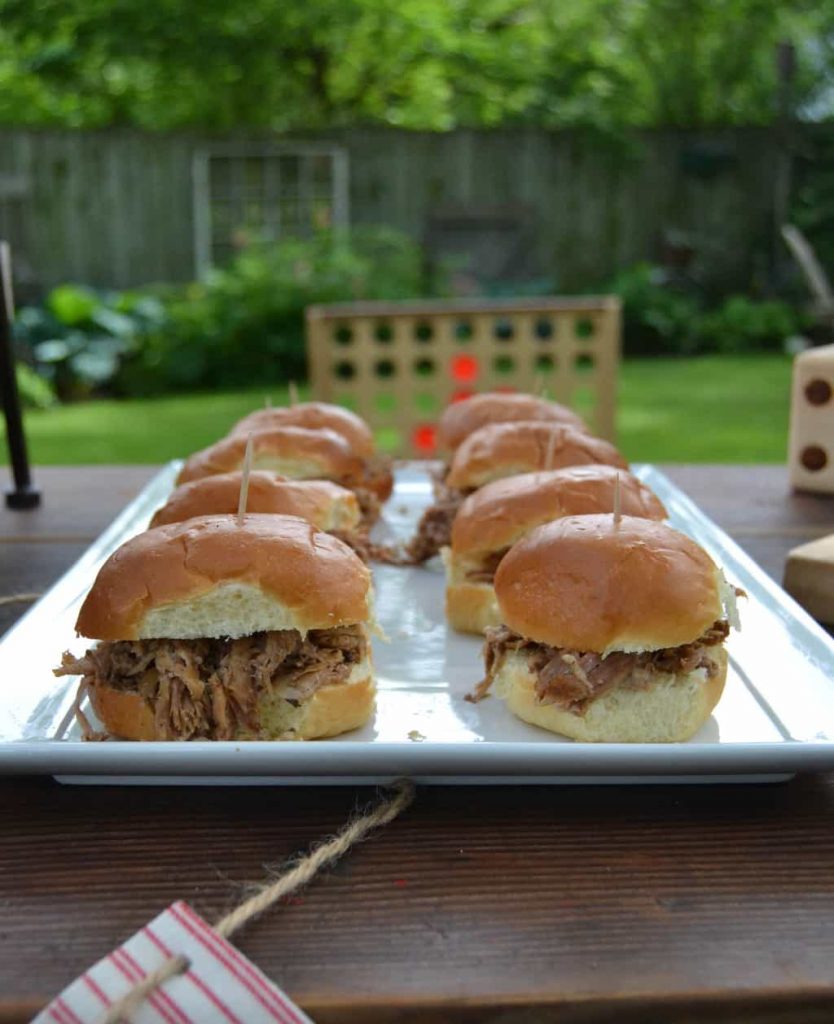 Coca-Cola™ BBQ Pulled Pork Sliders - Looking for an easy meal to make during your summer back yard party? These Coca-Cola™ BBQ Pulled Pork Sliders are easy to make and a definite crowd pleaser.