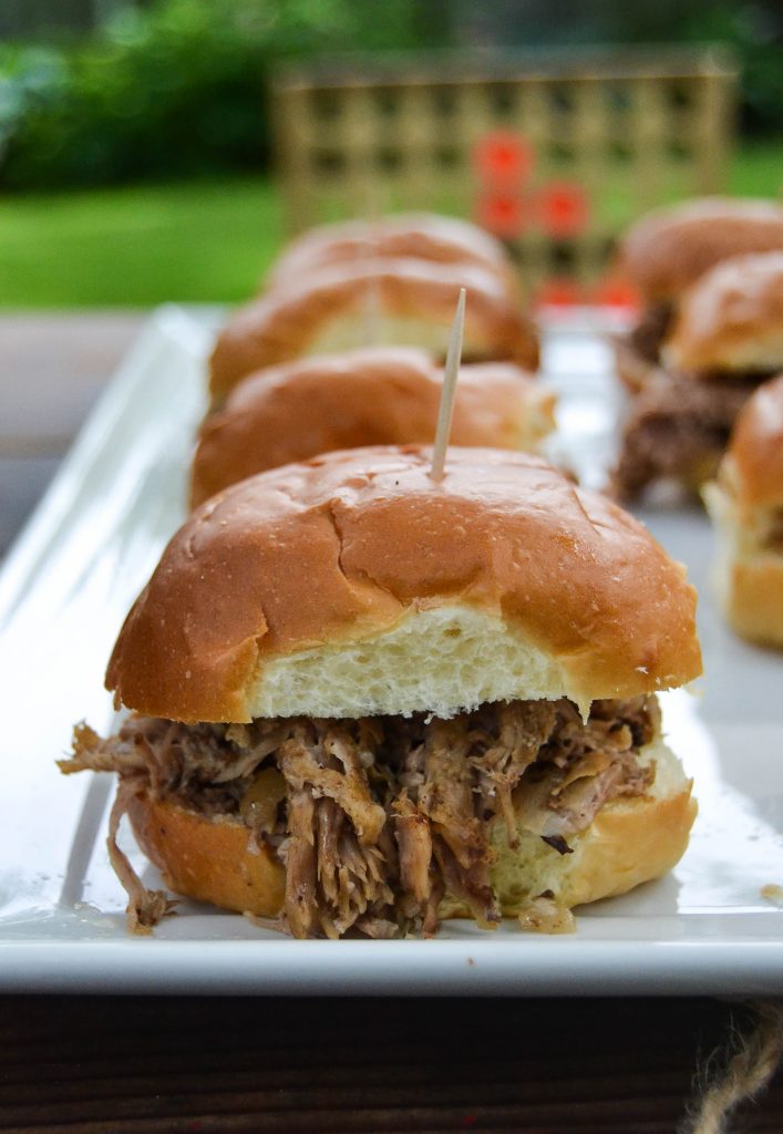 Coca-Cola™ BBQ Pulled Pork Sliders - Looking for an easy meal to make during your summer back yard party? These Coca-Cola™ BBQ Pulled Pork Sliders are easy to make and a definite crowd pleaser.