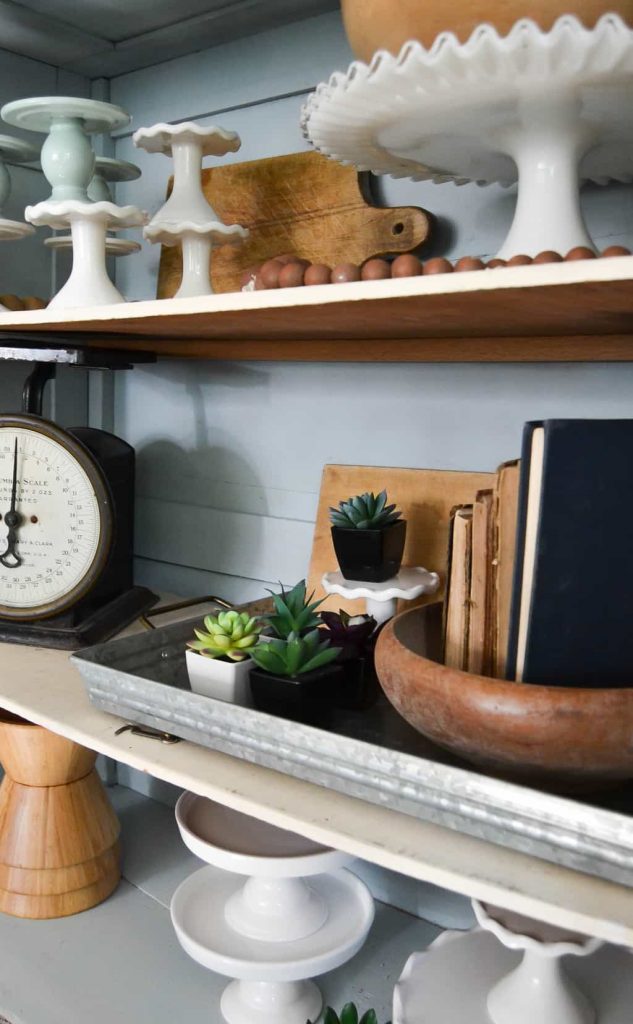 DIY Farmhouse Hutch Makeover - This white farmhouse hutch makeover took this piece from drab to farmhouse fab in no time!