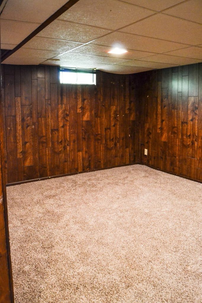 The Easy Way To Paint Paneling - If you have paneling in your home and would like to change it but don't have a big budget, paint it! This post will show you The Easy Way To Paint Paneling!