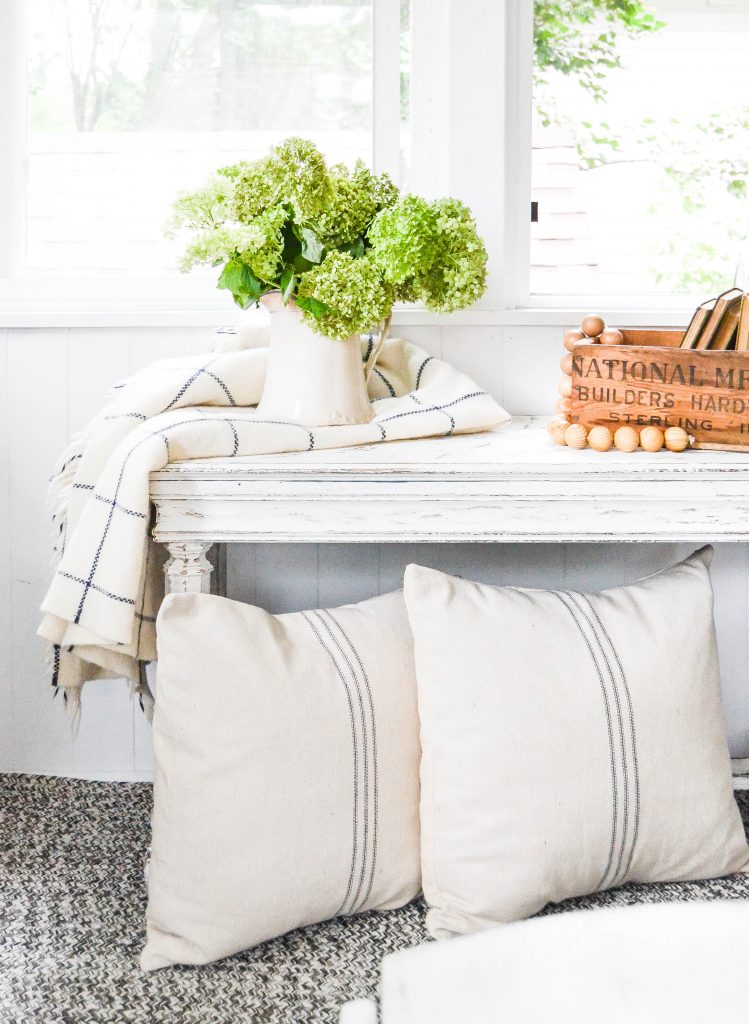 Piano Bench Turned Farmhouse Bench - Looking for frugal ways to add farmhouse style to you home? Check out this Piano Bench Turned Farmhouse Bench from My Creative Days just using paint and sandpaper!