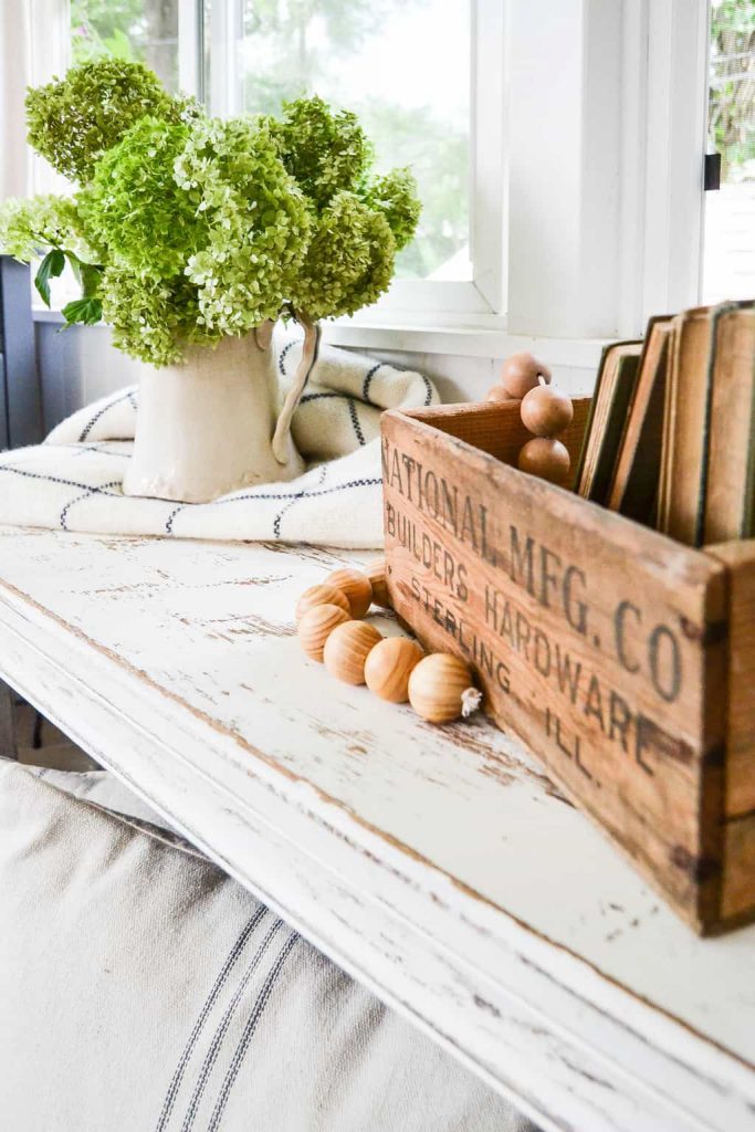 Piano Bench Turned Farmhouse Bench - Looking for frugal ways to add farmhouse style to you home? Check out this Piano Bench Turned Farmhouse Bench from My Creative Days just using paint and sandpaper!