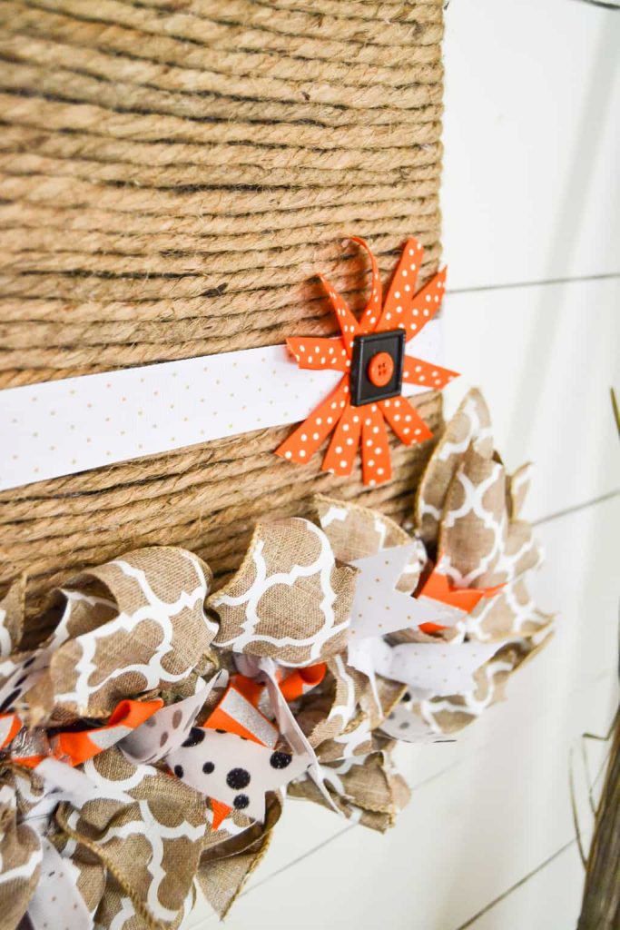 Looking for a unique way to add a fall wreath to your home? This Witch Hat Wreath For Fall is easy to make and gives a whole new meaning to fall wreath.
