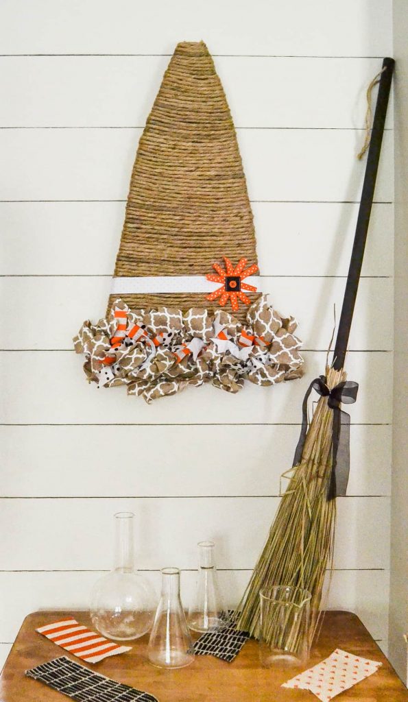 Looking for a unique way to add a fall wreath to your home? This Witch Hat Wreath For Fall is easy to make and gives a whole new meaning to fall wreath.