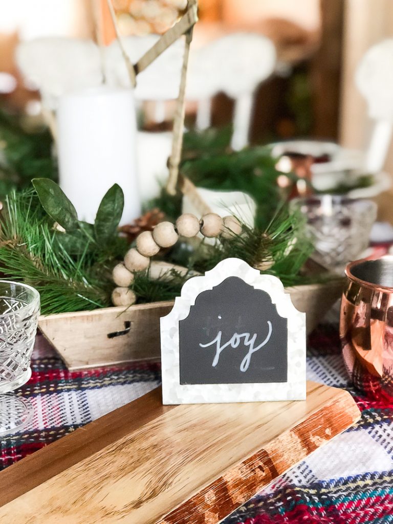 Put together and easy Christmas Tablescape to celebrate around during the holiday season!