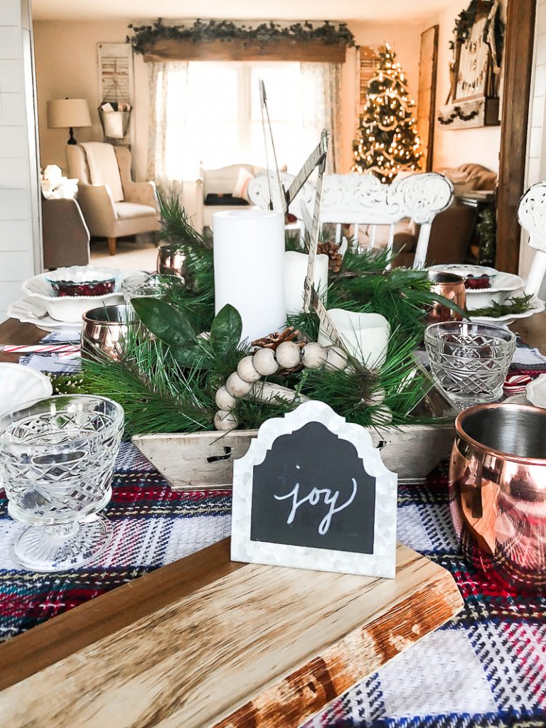 Put together and easy Christmas Tablescape to celebrate around during the holiday season!