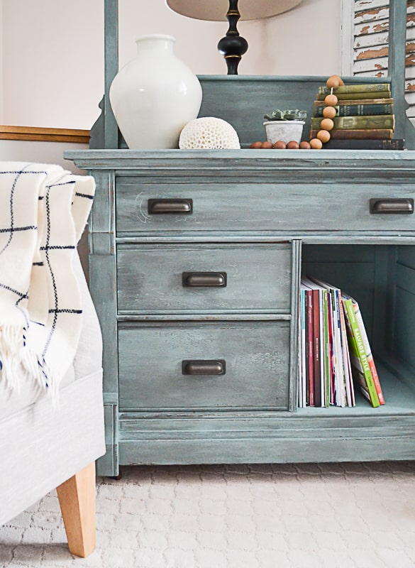 Finding an antique chest of drawers that is in need of a makeover is like finding the golden ticket! This antique chest of drawers makeover was easy to do with some paint and black wax. Click over to see how to do it!