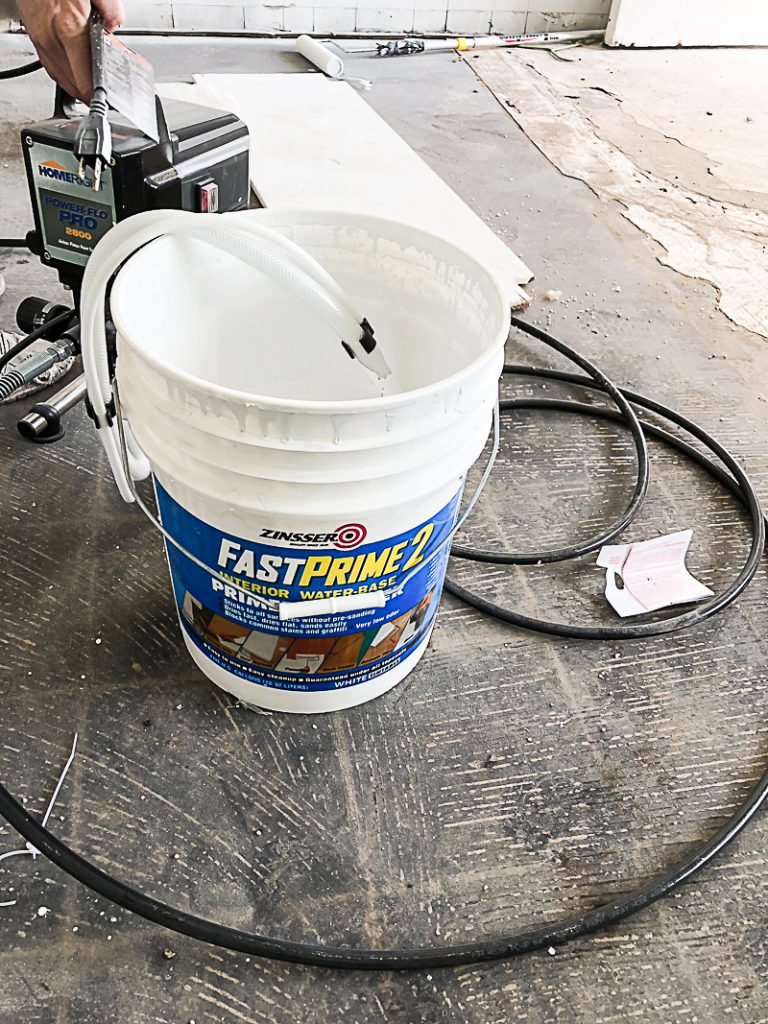 If you are looking to invest in a paint sprayer that is going to be your painting projects easier and faster, click over to find the paint sprayer that helped us prime the walls in the entire house in an hour.