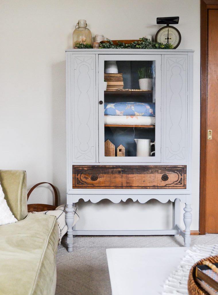 If you have a china cabinet that is in need of a makeover, click over to see how easy it was to transform this china cabinet to make it more relevant and less dingy.