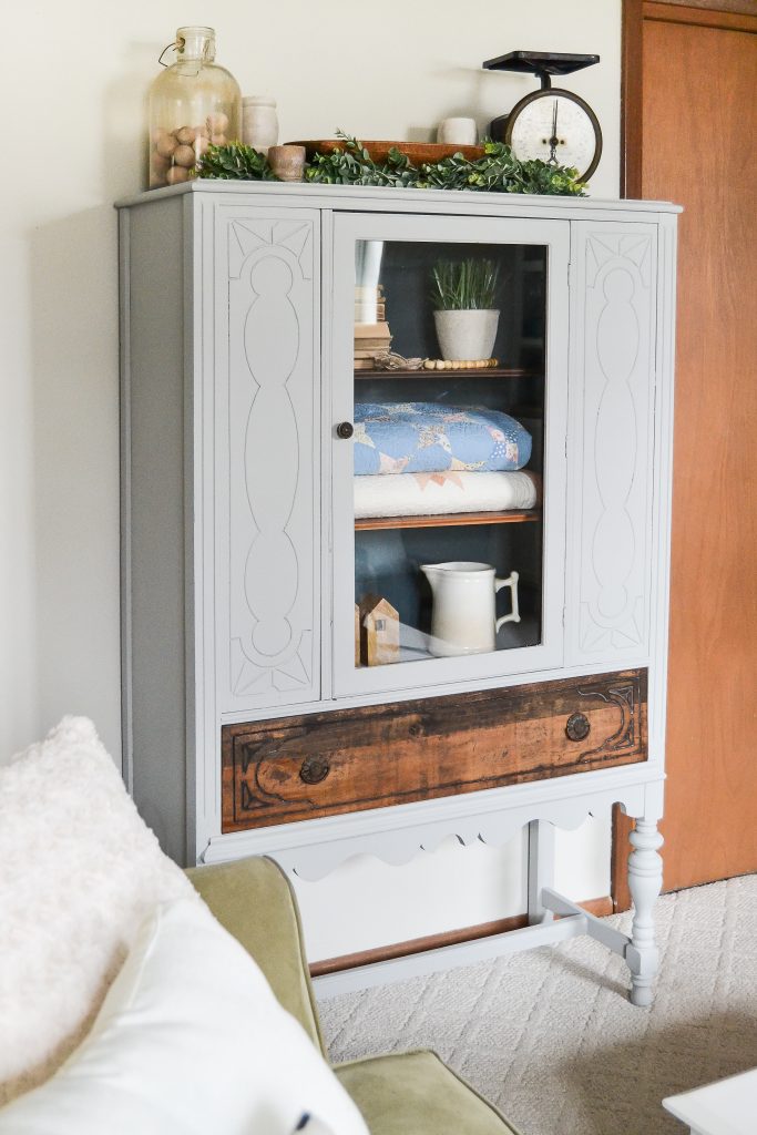 If you have a china cabinet that is in need of a makeover, click over to see how easy it was to transform this china cabinet to make it more relevant and less dingy.