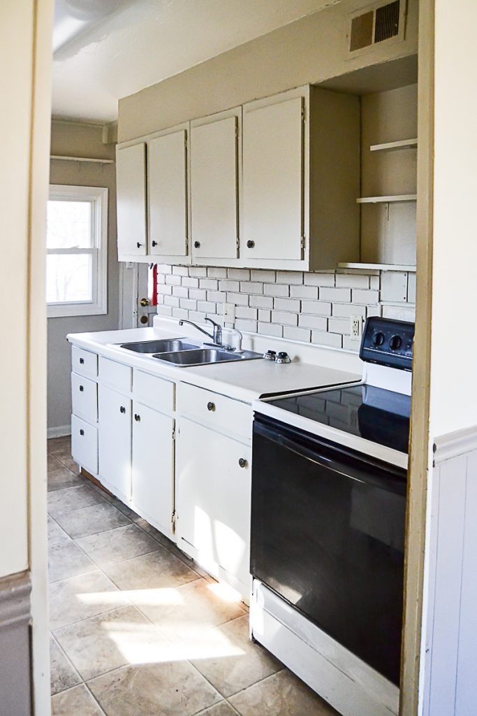 If you are thinking about adding unfinished wood cabinets to your home or a flip house, click over to see how we added them to our third project and what a difference they made to the kitchen.