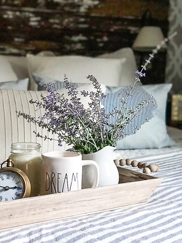 If you want to change your bedroom, but don't want to spend a lot of money, click over to see how to get a mini budget bedroom makeover that refreshes it to make it feel brand new.