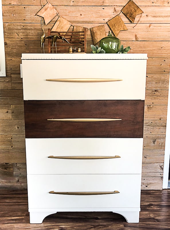 If you love the look of a Mid-Century Modern Dresser, click over to find the easy way to DIY one that will save your budget!