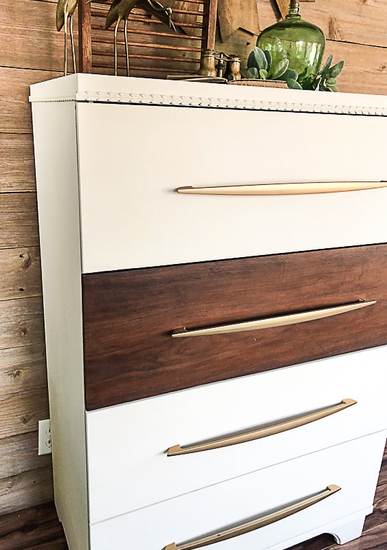 If you love the look of a Mid-Century Modern Dresser, click over to find the easy way to DIY one that will save your budget!