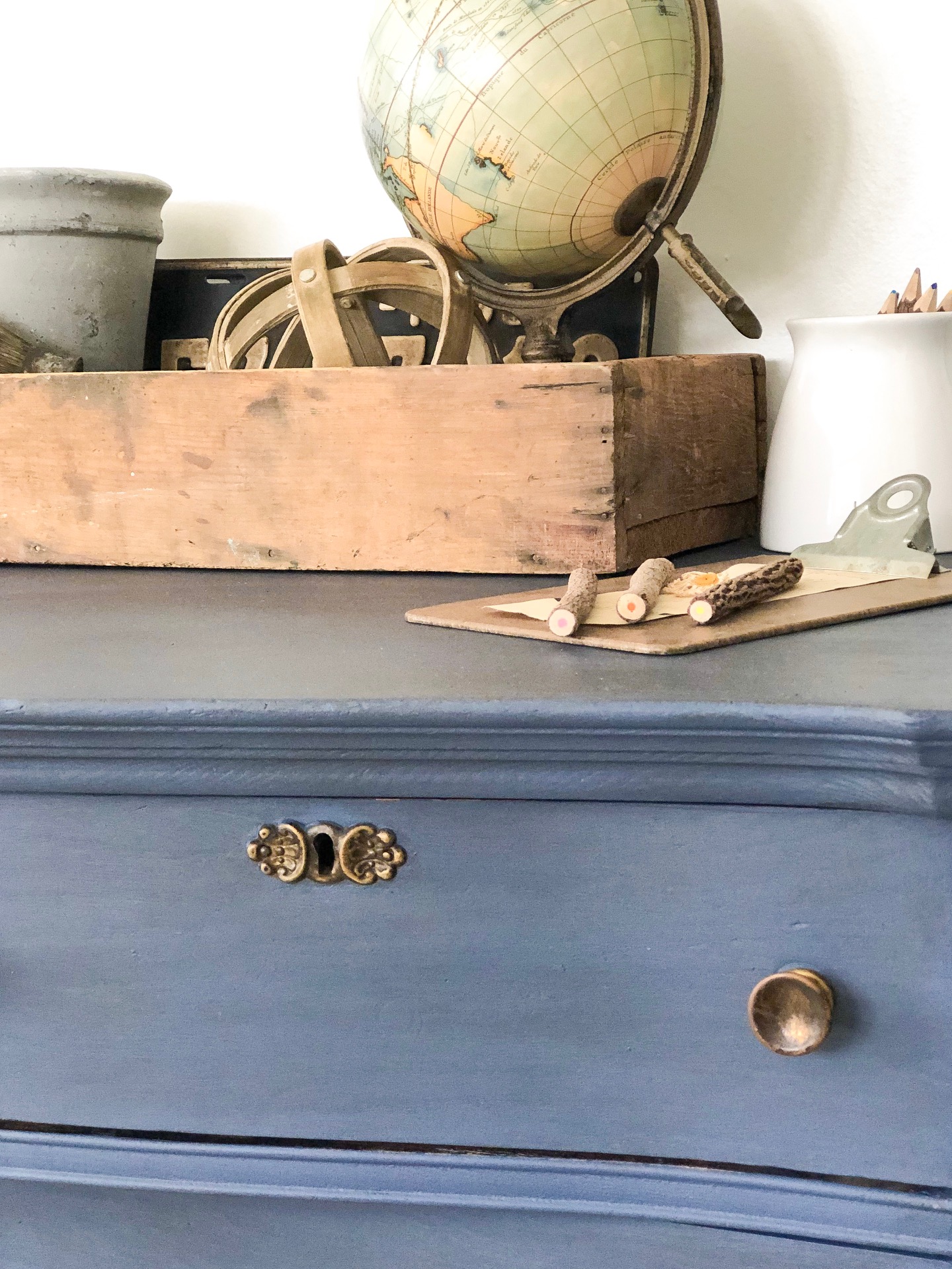 If you are looking for a beautiful blue dresser, click over to see how to DIY an old dresser into a glazed blue dresser beauty!