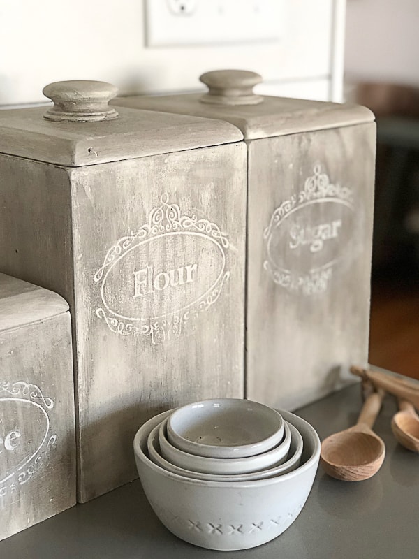 Kitchen canisters come in all shapes and sizes and this easy project made some old canisters look totally new and fresh for an updated kitchen.