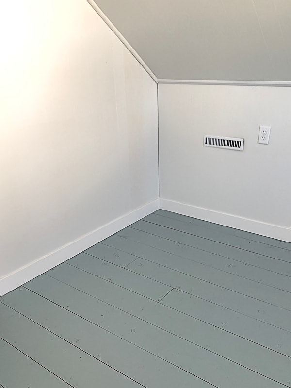 If you want to paint a wood floor, click over to find the paint for wood floors we used and loved!