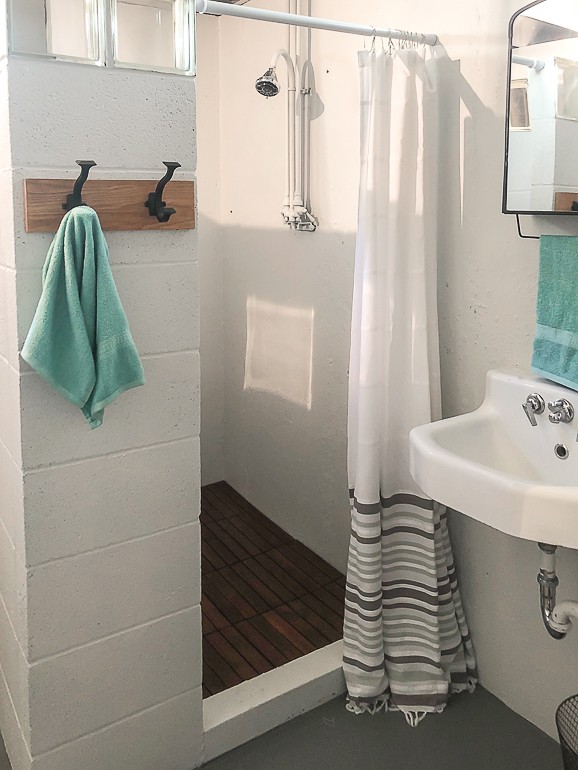 A basement bathroom makeover that was easy and only cost $216 to do. We are breaking down all of the costs and the projects in the transformation.