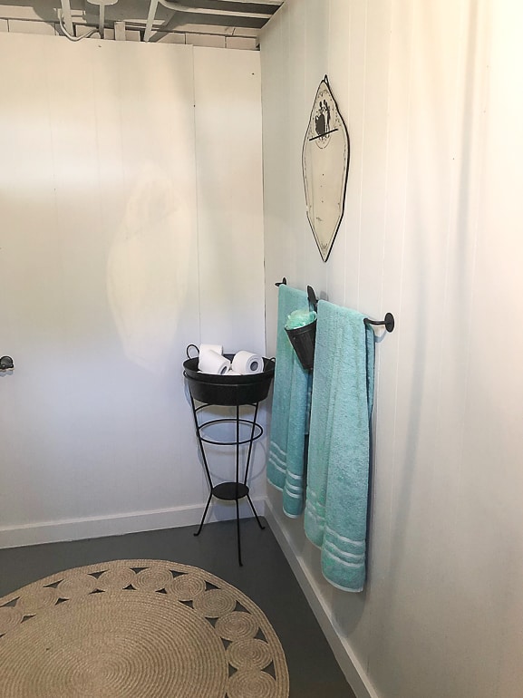 A basement bathroom makeover that was easy and only cost $216 to do. We are breaking down all of the costs and the projects in the transformation.