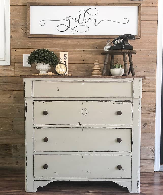 Painting furniture can be intimidating. This post will wall you through the easy steps and teach you how to paint a wooden dresser.
