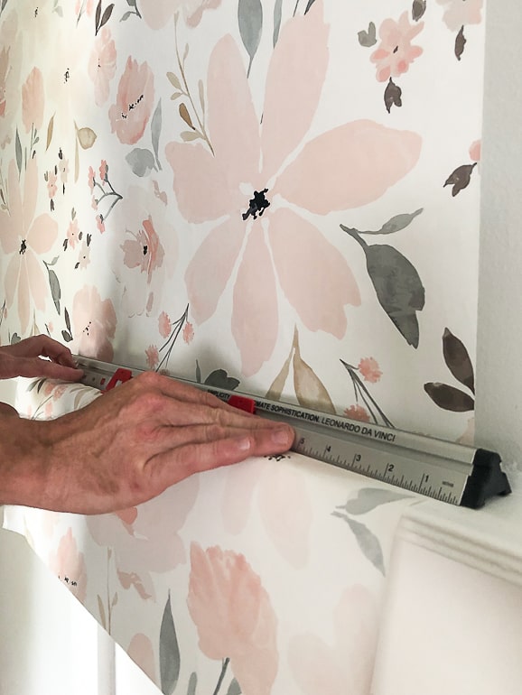 This beginner's guide to How To Wallpaper answers all the newbie questions, goes over supplies needed and the steps it takes to hang wallpaper in your home.