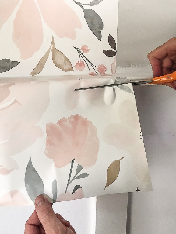 This beginner's guide to How To Wallpaper answers all the newbie questions, goes over supplies needed and the steps it takes to hang wallpaper in your home.