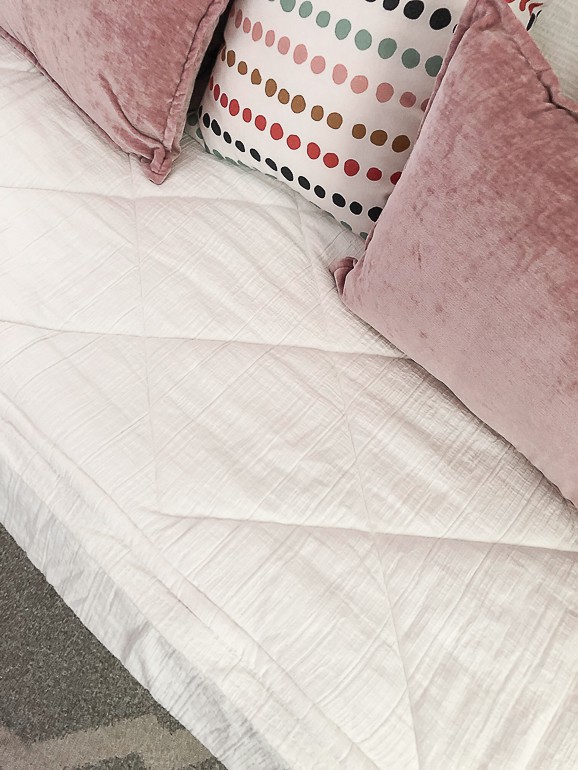 Beddy's bedding takes the stress out of making the bed. All the bedding pieces come as one unit that you zip to make and unzip to wash. It is genius!