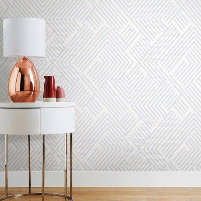 If you are looking to hang wallpaper in a girls room, this post is full of beautiful options for wallpaper for girls bedrooms. 